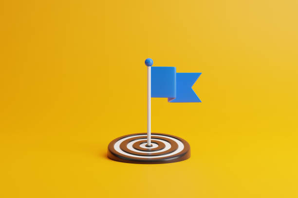 Flag in the middle of target on a yellow background Flag in the middle of target on a yellow background. Aimed at a goal, increase motivation, a way to achieve a goal concept. 3d rendering illustration archery target group of objects target sport stock pictures, royalty-free photos & images