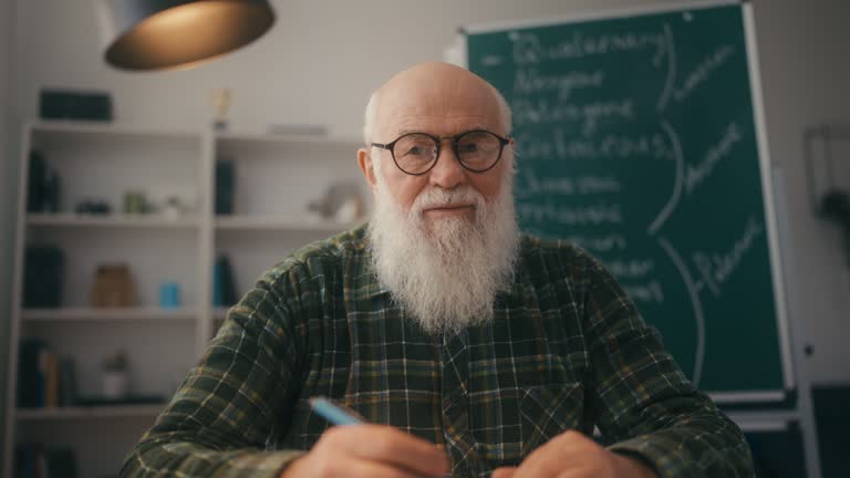 College professor explaining geological periods via video call, online class