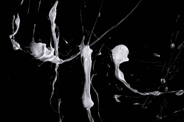 istock Splashes of cosmetic cream on a black background. 1494894994