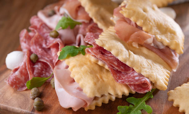 istock Crescentina. Food of Emilia Romagna region, deep fried bread gnocco fritto or crescentina. Starter or aperitif in Italy. 1494899202