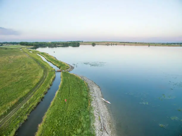 lake (Lonetree Reservoir) and irrigation ditch in northern Colorado near Loveland - aerial view