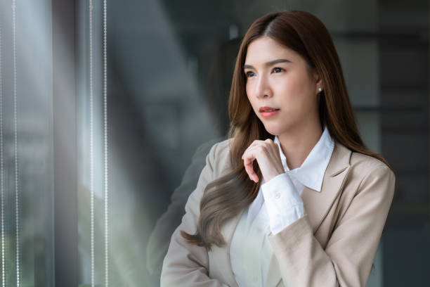 istock Businesswoman Standing at workplace Decision Fatigue having problem and feels confused 1494906221