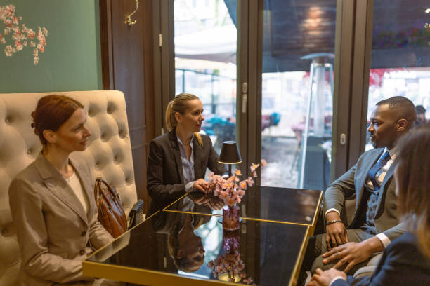 istock Relaxed Business Professionals Enjoying a Casual Chat During Their Coffee Break in Central Frankfurt 1494907413