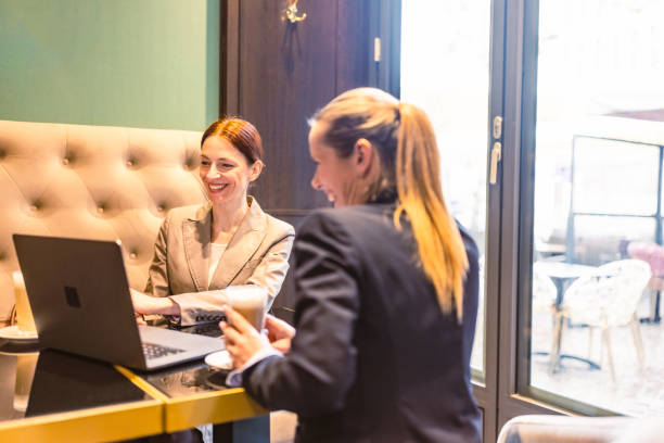 istock Colleagues business talk in a cafeteria 1494907608