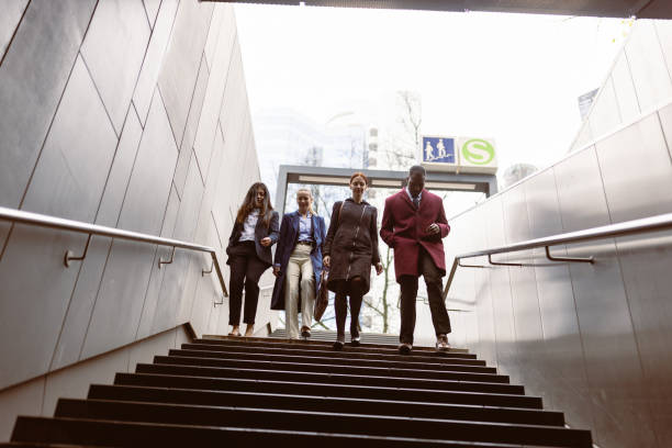 istock Business people rushing to the subway 1494910283