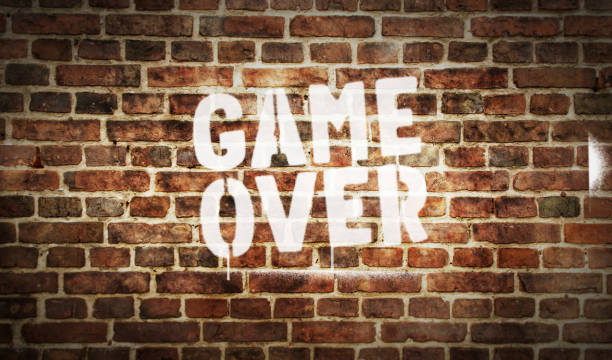 istock Game over symbol spray painted on the brick wall 1494912022