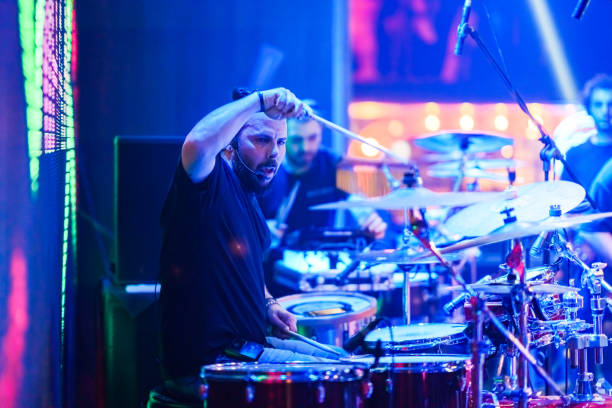 istock The drummer plays live music on stage 1494912048