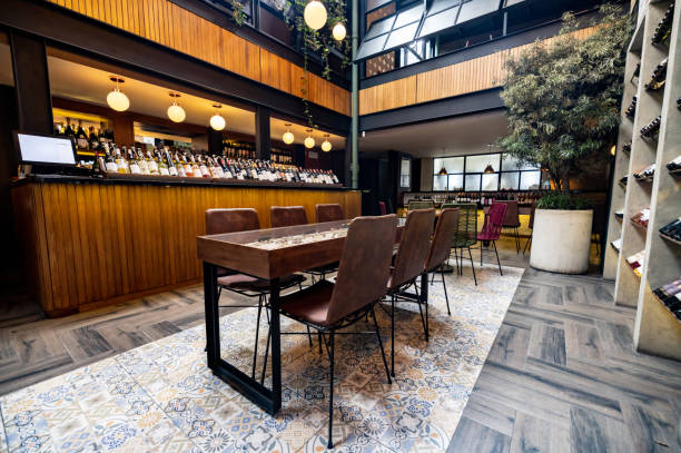 Shot of a modern restaurant with no people Shot of a beautiful modern restaurant with no people - food and drink establishment concepts wine bar counter stock pictures, royalty-free photos & images
