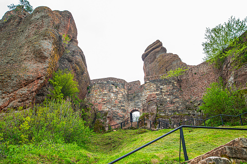 29 April 2023, Belogradchik, Bulgaria, Belogradchik cliff rocks and wall at ancient Kaleto, landmark of Bulgaria is great touristic attraction.