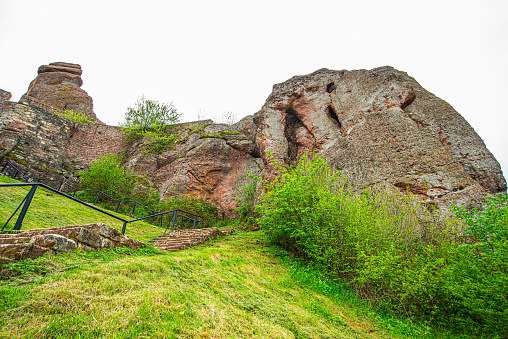 29 April 2023, Belogradchik, Bulgaria, Belogradchik cliff rocks and wall at ancient Kaleto, landmark of Bulgaria is great touristic attraction.