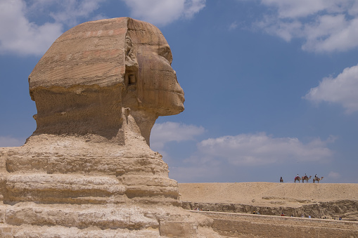 Cairo, Egypt - April 29, 2023: Profile view of the Sphinx of Giza