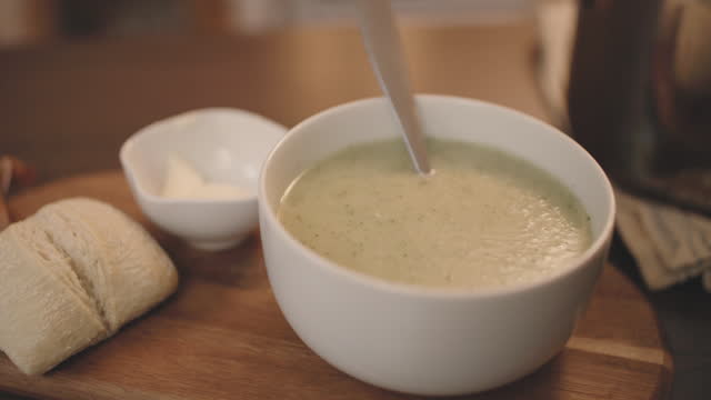 vegan leek potato soup with crust bread roll
