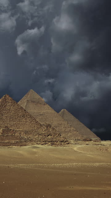 Great pyramids and storm clouds