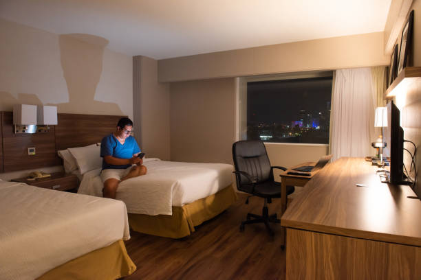 istock Man working at night in his hotel room 1494918913