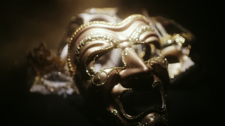 Golden Masks in Dark Setting