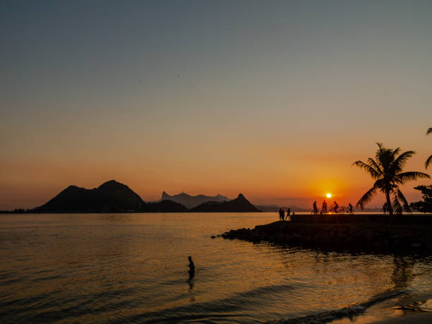 istock Time for People to enjoy a beach at sunset 1494928423
