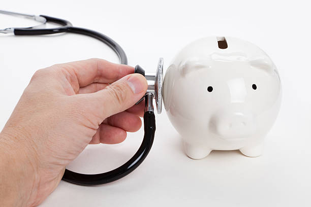 istock Stethoscope and Piggy Bank 149492843