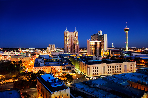 San Antonio downtown just after sunset showing skyline around Tower of the Americas & city lights