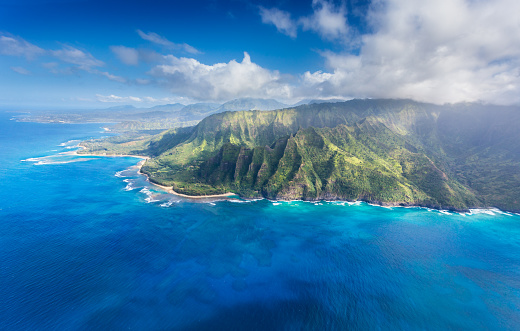 Deeply edtched Na Pali cliffs, Ke'e Beach, Ha'ena Beach State Park, Tunnels Beach leading to Hanalei Bay, Kauai.