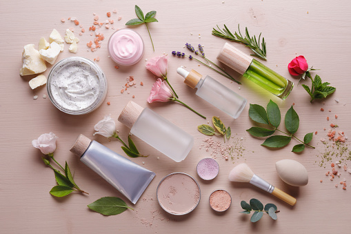 Zero waste and organic beauty produts with leaves and flowers