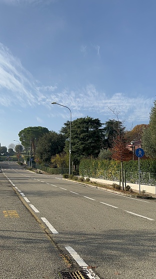 imola, Italy – January 14, 2023: A vertical shot of a deserted street with no people or traffic in sight