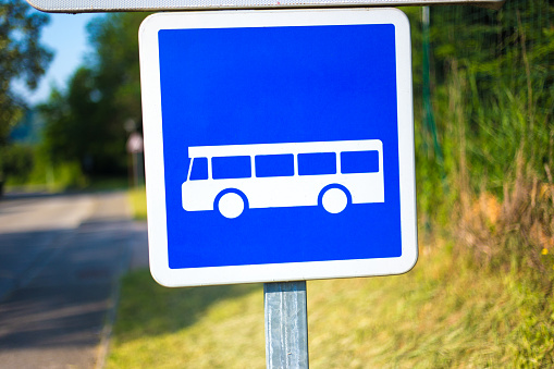 France: Blue Sign with Bus/Bus Stop Symbol. Shot in Department of Isere.