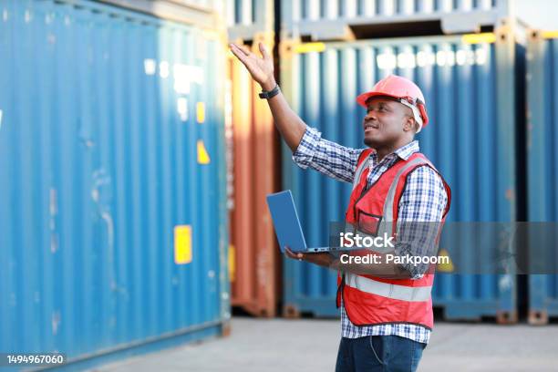 Foreman Using Computer And Pointing Something To Control Loading ...
