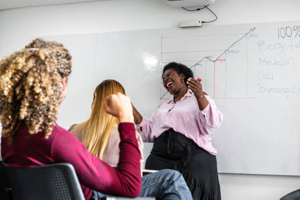 istock group of employees are gathered in a boardroom talking about labor issues 1494979556