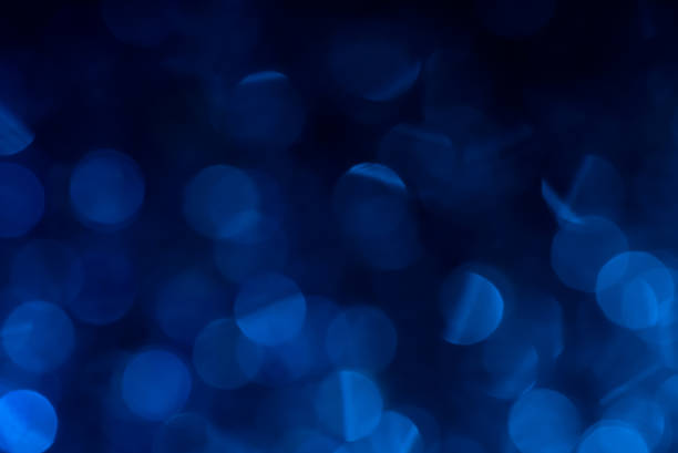 istock Blue bokeh fading to black at top 1494988077