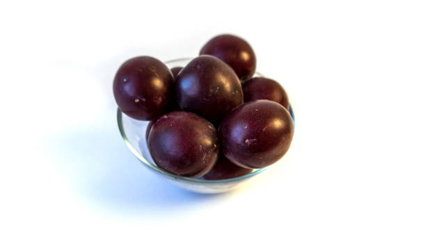 istock photo of plum on a plate, isolate 1494990801