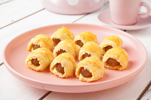 Pineapple Tart Roll cookies or Malay named Tart Nanas Gulung on white background