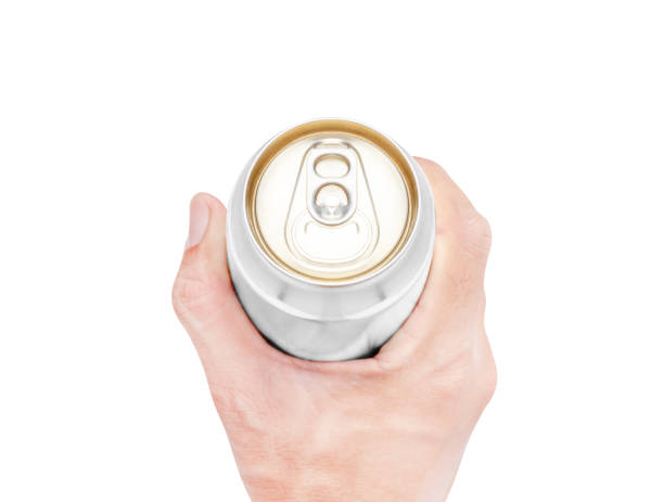 istock Top view hand hold mockup shiny aluminum can isolated on white background with clipping path 1494998318