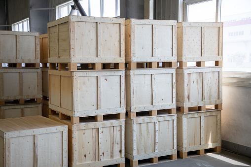 Wooden boxes in the warehouse.  Warehousing