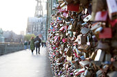 Love locks on the Hohenzollern Bridge with pedestrians