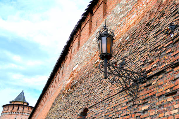 two lanterns on top of a house