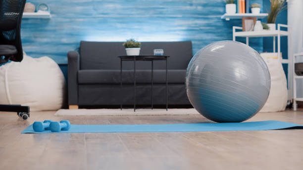 istock Empty living room with sport and workout equipment 1495017972