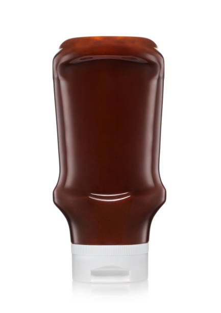 istock Smoky barbecue bbq classic sauce in plastic container on white background. 1495018433