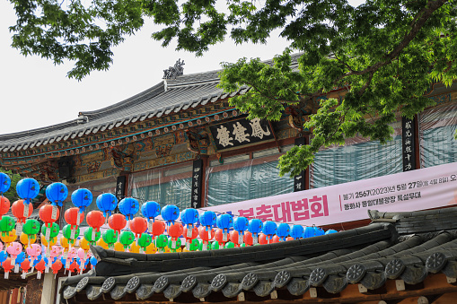 Yellow traditional bright lamp and the Korean flag at Bukchon Hanok Village is an old traditional Korean neighborhood without tourists.