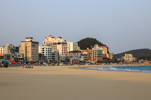 Haeundae beach area in Busan, South Korea at dawn.