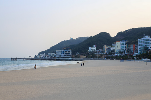 Haeundae beach area in Busan, South Korea at dawn.