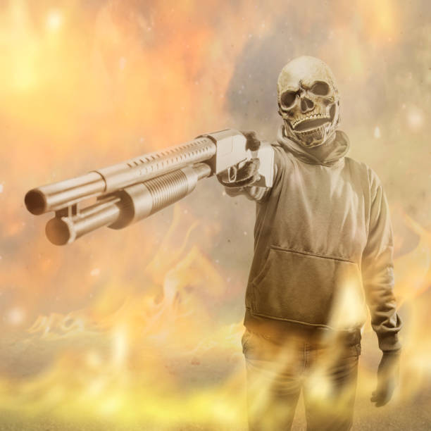 istock Man wearing a mask holding a gun 1495022725