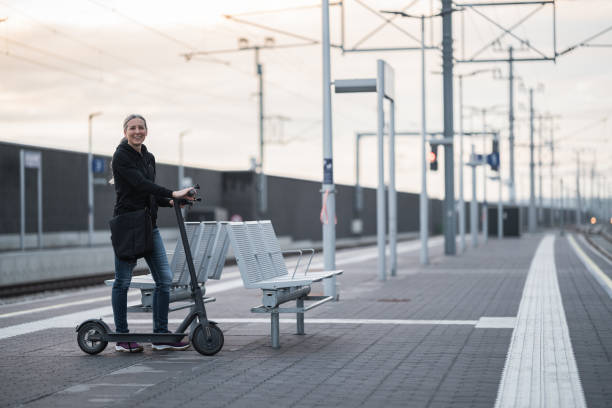 istock woman waiting on railway station platform 1495025892