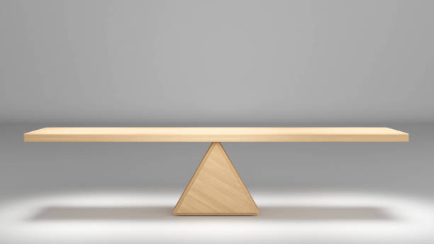istock valuation of two different objects,wooden scales on a white background,3d rendering 1495026890