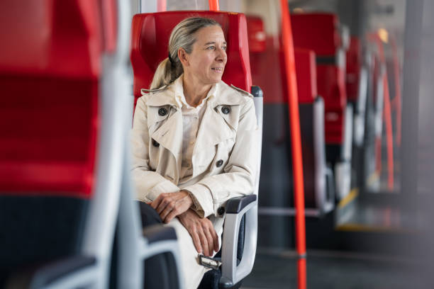 istock woman sitting in train on way to work 1495029113