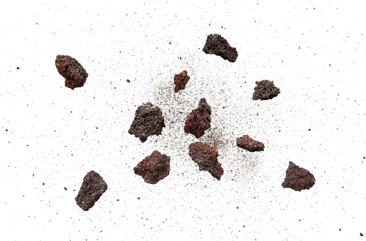 Blast of rock with dust particle isolated