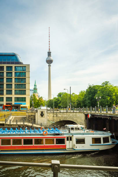 istock passenger ship under bridge in historic berlin at sunny day 1495036029