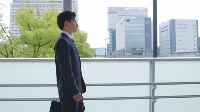 Young japanese businessman working