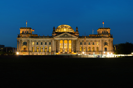 front view of the the illuminated  Berlin Reichstag at night