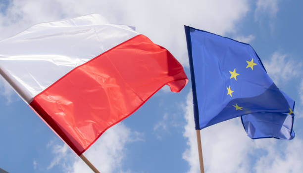 istock Polish flag against the sky 1495041464
