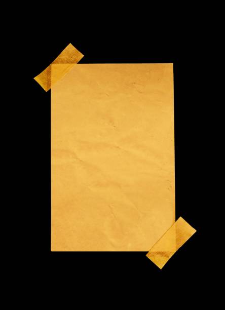 Four yellow sticky note on brown clipboard or plywood board background